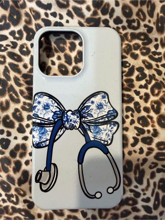 Other - iPhone 16 Pro Max White Phone Case with Blue Floral Bow and Stethoscope Graphic